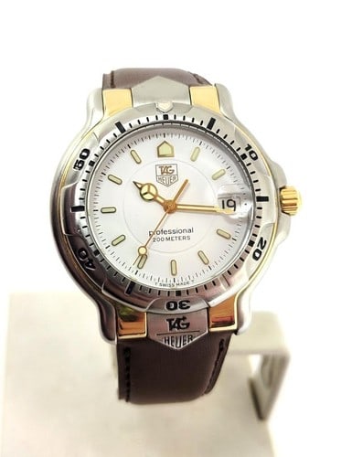 S/Steel & 18k Mens TAG HEUER 6000 PROFESSIONAL 200m Watch Ref WH1151* EXLNT: Reserve: $999.00 Shipping: Domestic: Flat-rate of $33.00 to anywhere within the contiguous U.S. International: Foreign shipping rates are determined by destination. International shipping may be