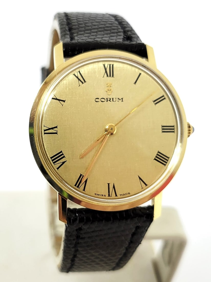 Vintage Solid 18k Men's CORUM Winding Watch Ref 51127* EXLNT* SERVICED: Vintage Solid 18k Men's CORUM Winding Watch Ref 51127* EXLNT* SERVICED ??? This Men's Corum watch is Swiss made. Great present for yourself or someone you love! * Solid 18k yellow gold case and back i
