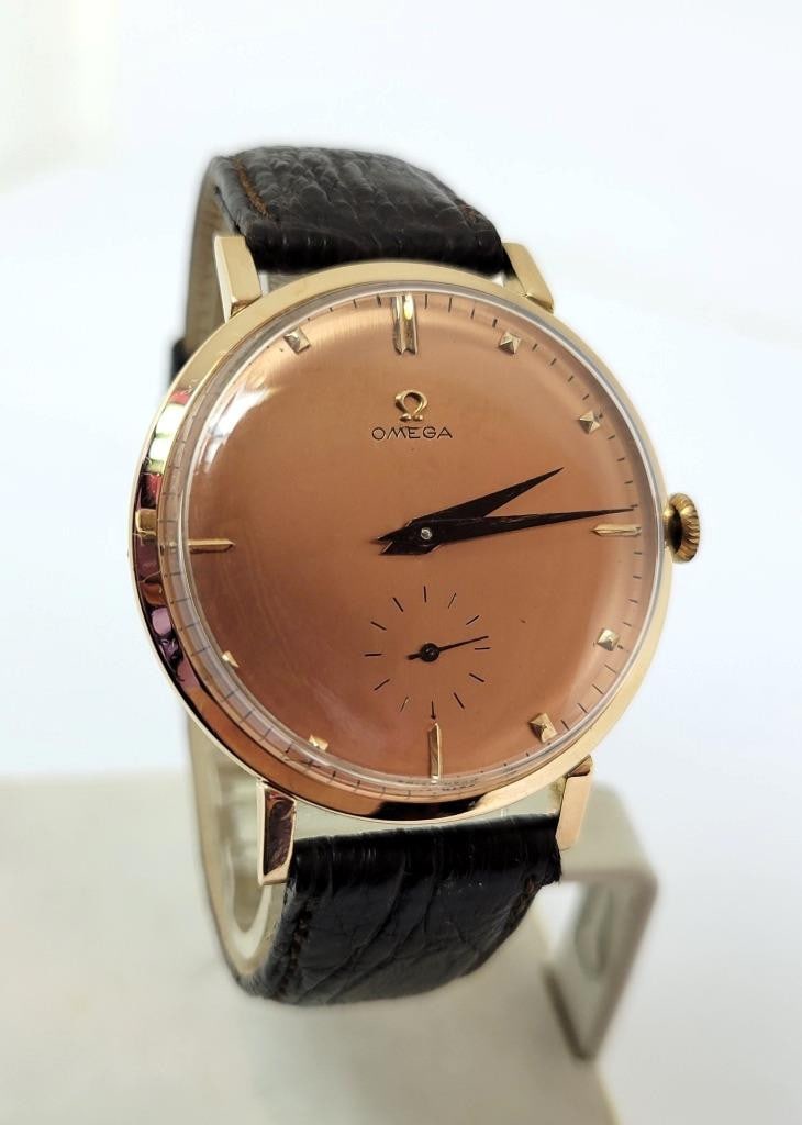 Vintage 18K Rose Gold OMEGA Mens Winding Watch c.1956 Cal.410* EXLNT: Vintage 18K Gold OMEGA Mens Winding Watch c.1956 Cal. 410* EXLNT ? This Mens Omega watch is Swiss made. Great present for yourself or someone you love as well as for vintage collectors or enthusiasts!