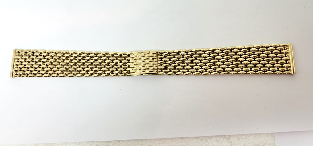 SOLID 14k Yellow GOLD Watch Bracelet to fit 18 mm Logs* 37.7 Grams EXLNT: SOLID 14k Yellow GOLD Watch Bracelet to fit 18 mm Logs* 37.7 Grams EXLNT * Solid 14k yellow gold link bracelet in 18 mm width in tubes to fit logs * Total length of bracelet is 6.75 inches (16.87 cm) 