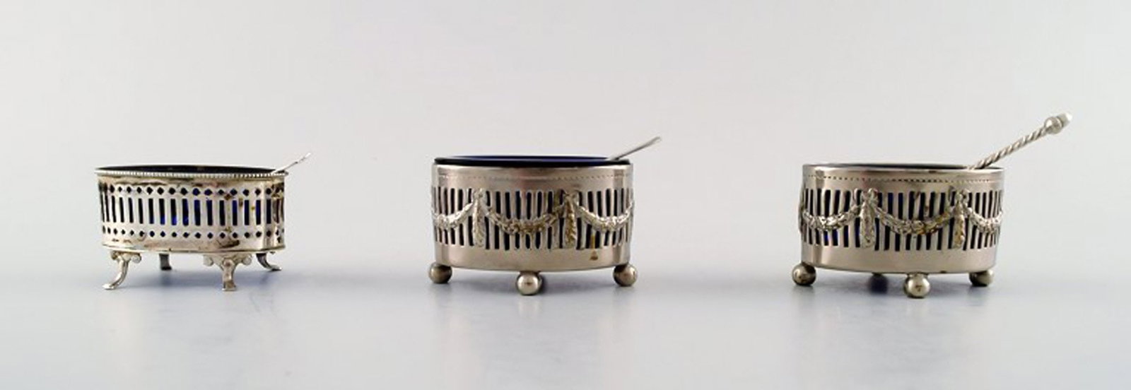 Three Danish salt jars in silver with blue glass inserts and salt spoons. (1 of 5)