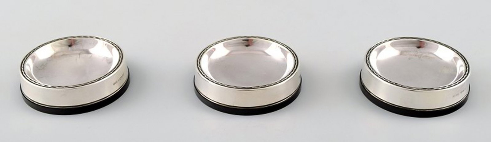 Vera Ferngren for GAB, Sweden. Three coasters in silver and bakelite. (1 of 3)
