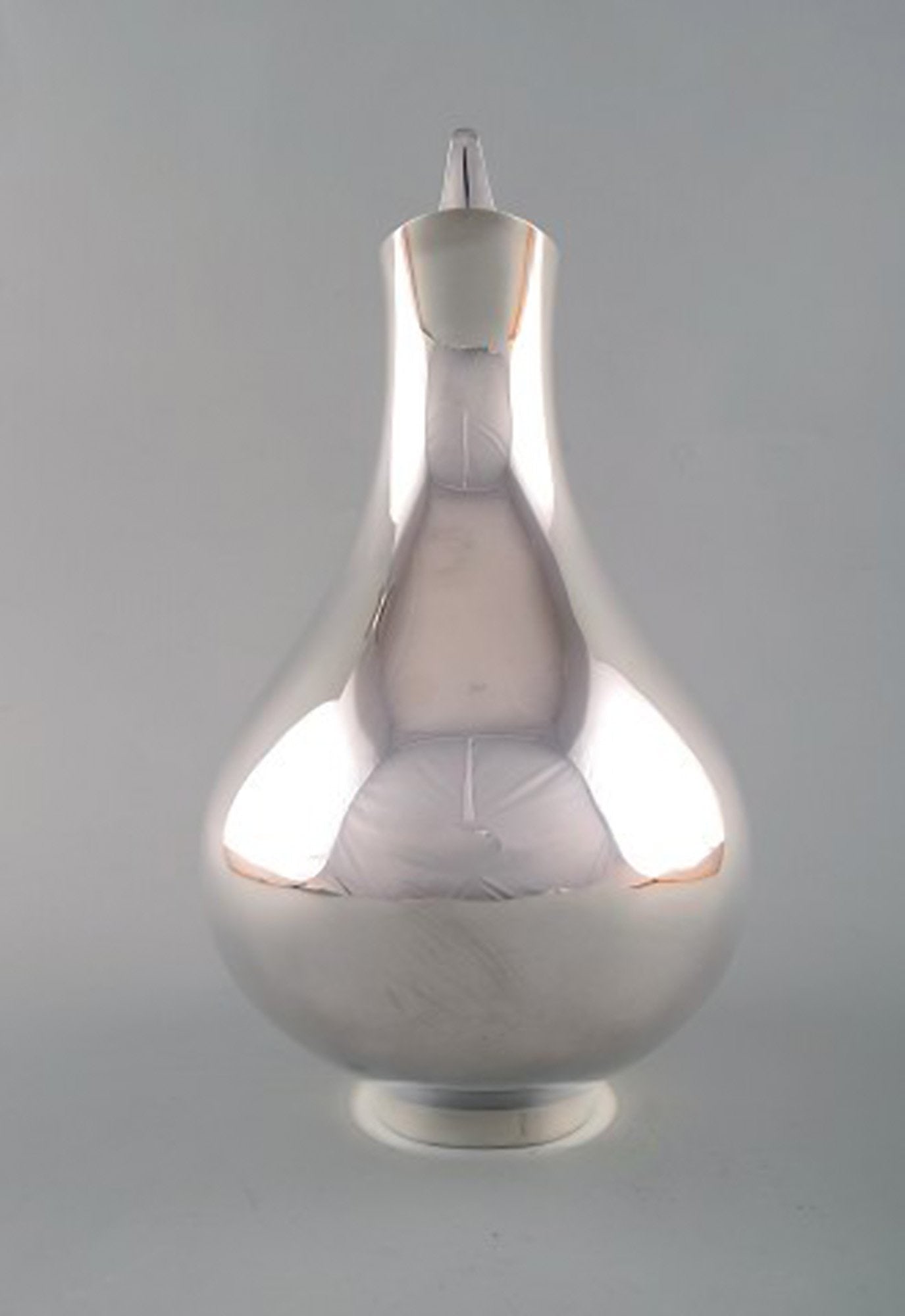 Henning Koppel for Georg Jensen. Modernist sterling silver jug. 'The Pregnant Duck'. Model number - 5