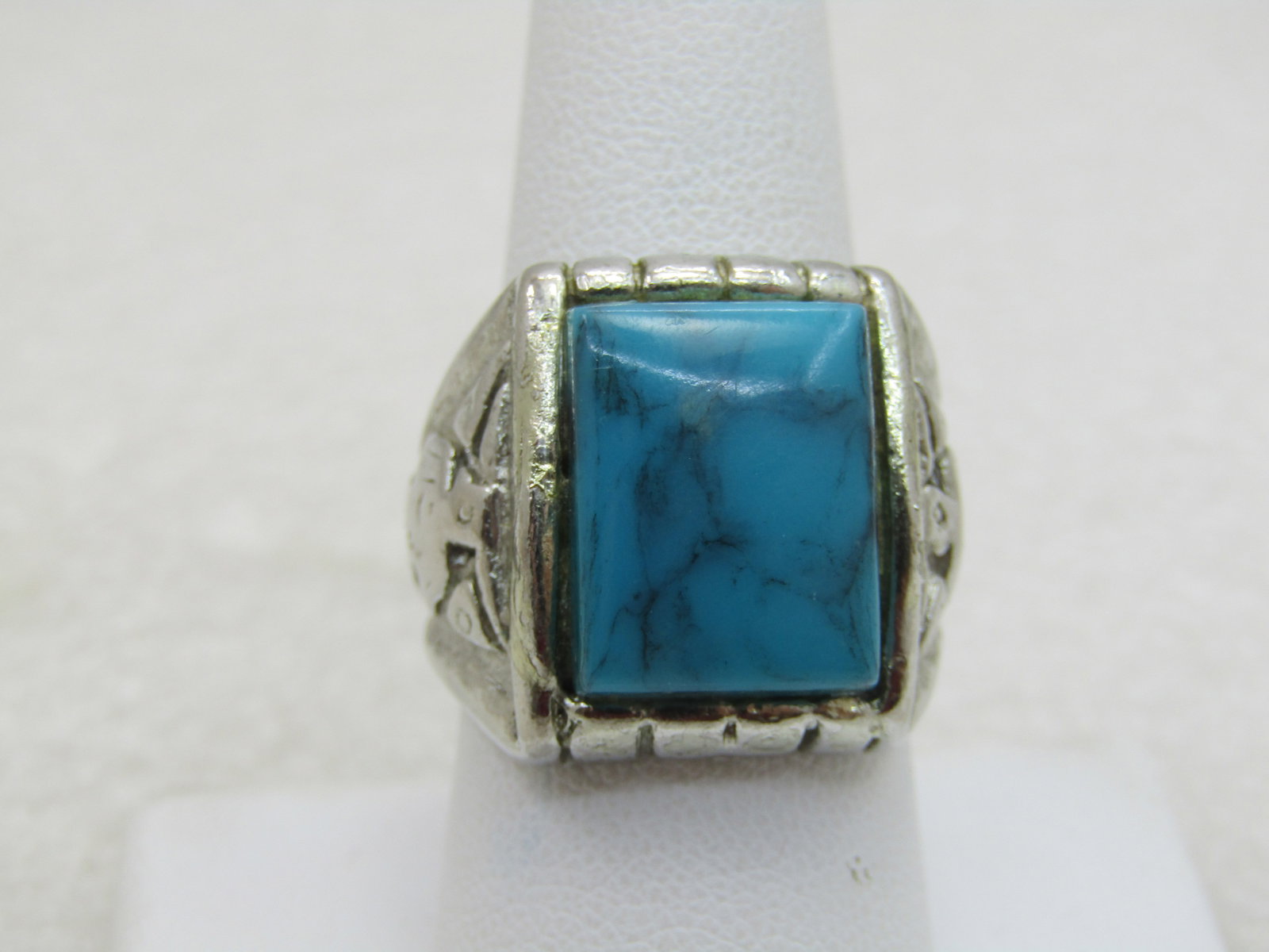 Vintage Southestern Faux Turquoise Ring, Sz 9, Silver Tone (NL): Title: Vintage Southestern Faux Turquoise Ring, Sz 9, Silver Tone (NL) Description: Vintage Southestern Faux Turquoise Ring, 1960'S-1970'S, Sz 9, Silver Tone (NL)/ thunderbird design on the side