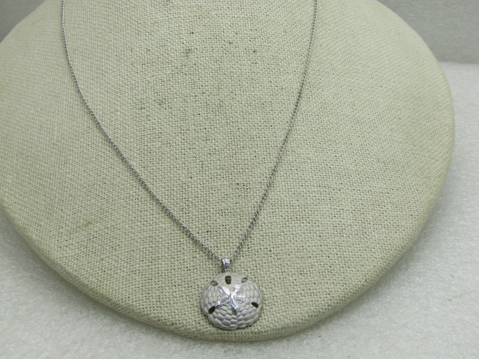 Vintage Sterling Silver Sand Dollar Necklace, 18", Signed B.A.B: Title: Vintage Sterling Silver Sand Dollar Necklace, 18", Signed B.A.B Description: Vintage Sterling Silver Sand Dollar Necklace, 18", Signed B.A.B, 2.94 gr. 1970's-1980's. Very good condition. The