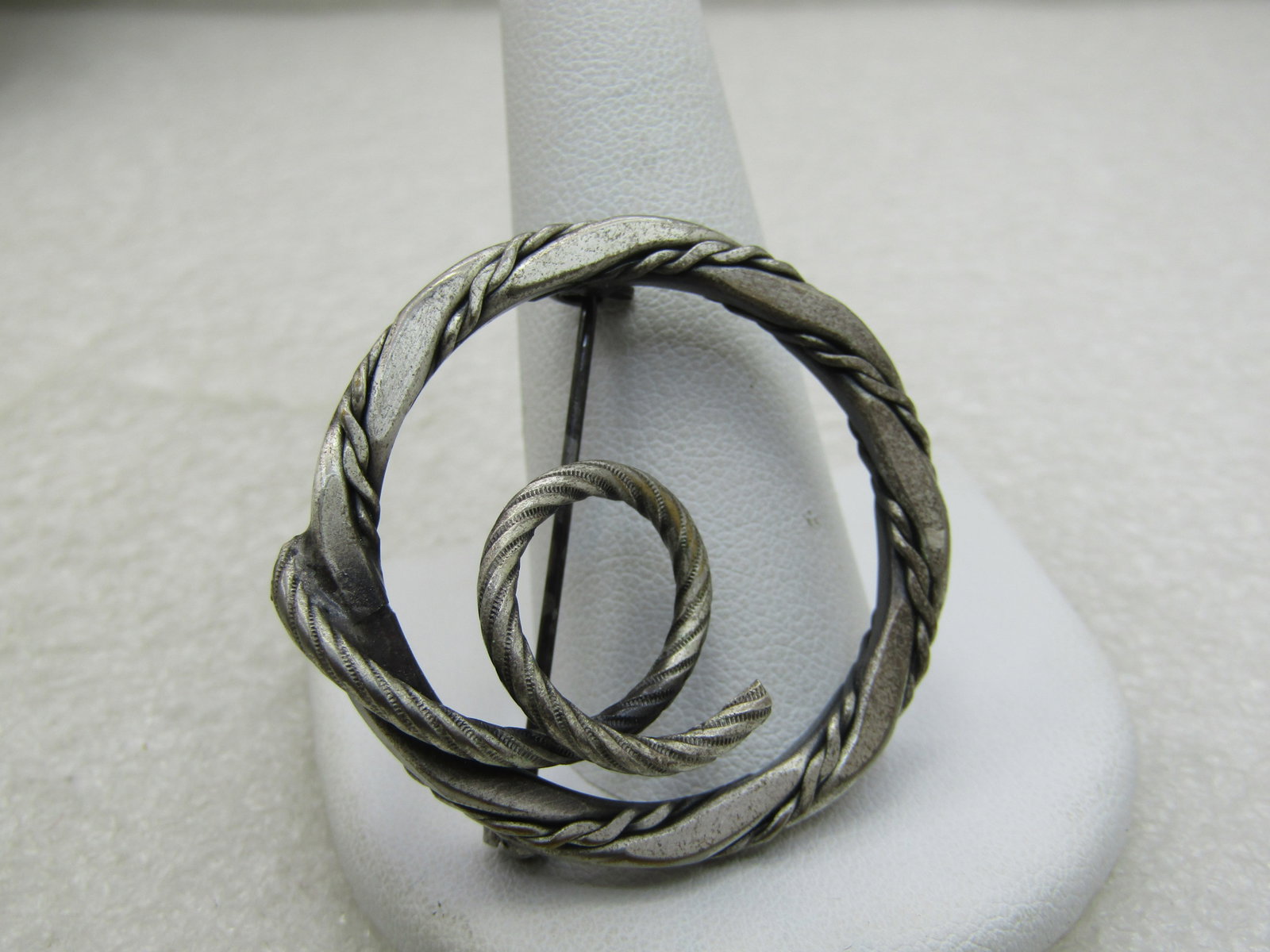 Vintage Burnished Sterling Circle Brooch, Coiled Accent 1.5" NL: Title: Vintage Burnished Sterling Circle Brooch, Coiled Accent 1.5" NL Description: Vintage Burnished Sterling Circle Brooch, Coiled Accent 1.5" , Appx. 12.87 grams. Rope accent intertwined with