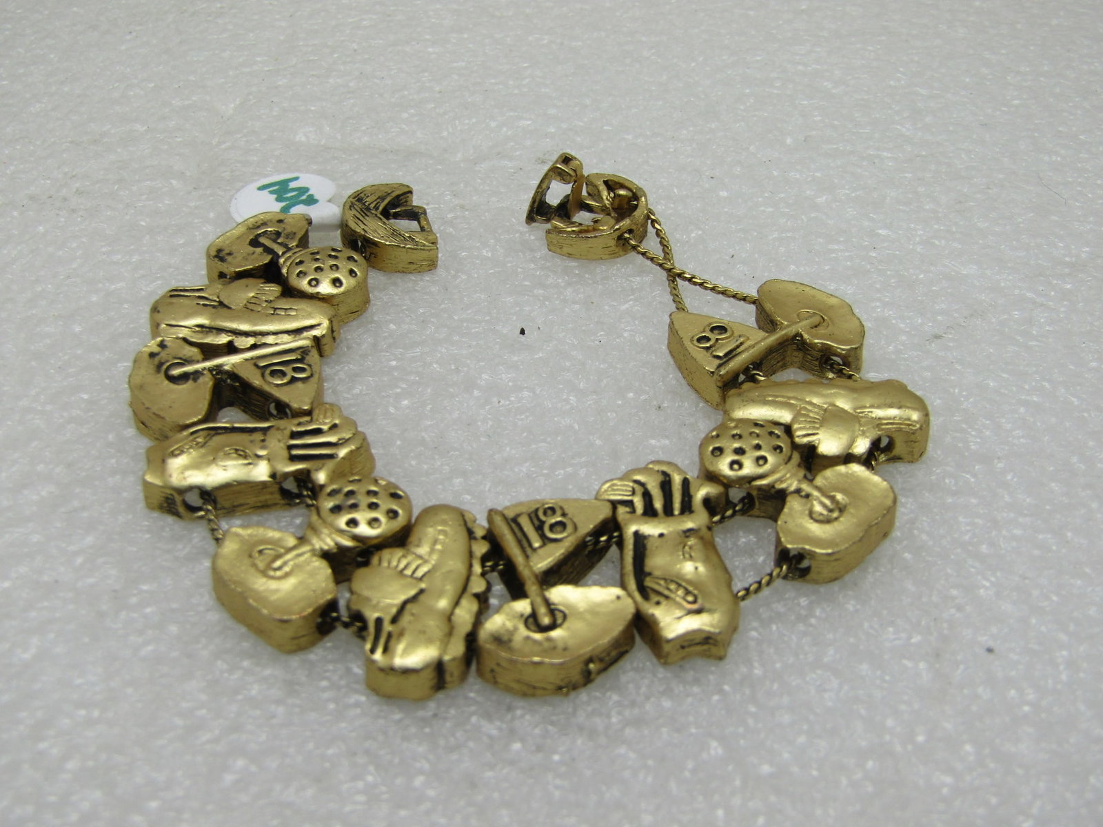 Ladies Golf Sliding Charm Bracelet 19mm Wide 7.25" Long: Title: Ladies Golf Sliding Charm Bracelet 19mm Wide 7.25" Long Description: Ladies Golf Sliding Charm Bracelet, 7.25". 19mm wide with slide charms on a double strand of rope link chain and includes
