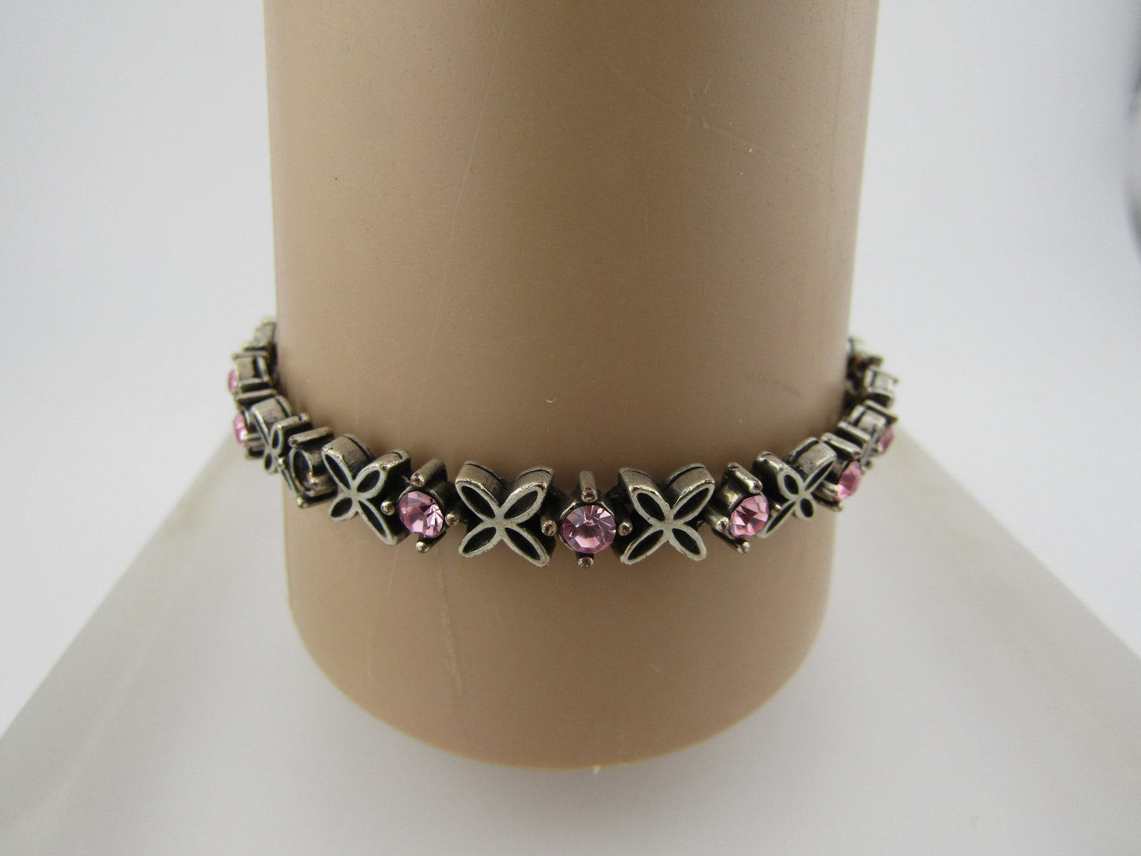 Vintage Silver Tone X Pink Rhinestone Bracelet, 7.5", 1970's-1980's: Title: Vintage Silver Tone X Pink Rhinestone Bracelet, 7.5", 1970's-1980's Description: Vintage Silver Tone X Pink Rhinestone Bracelet, 7.5". Age is estimated at 1970's-1980's. This is appx. 6.5mm