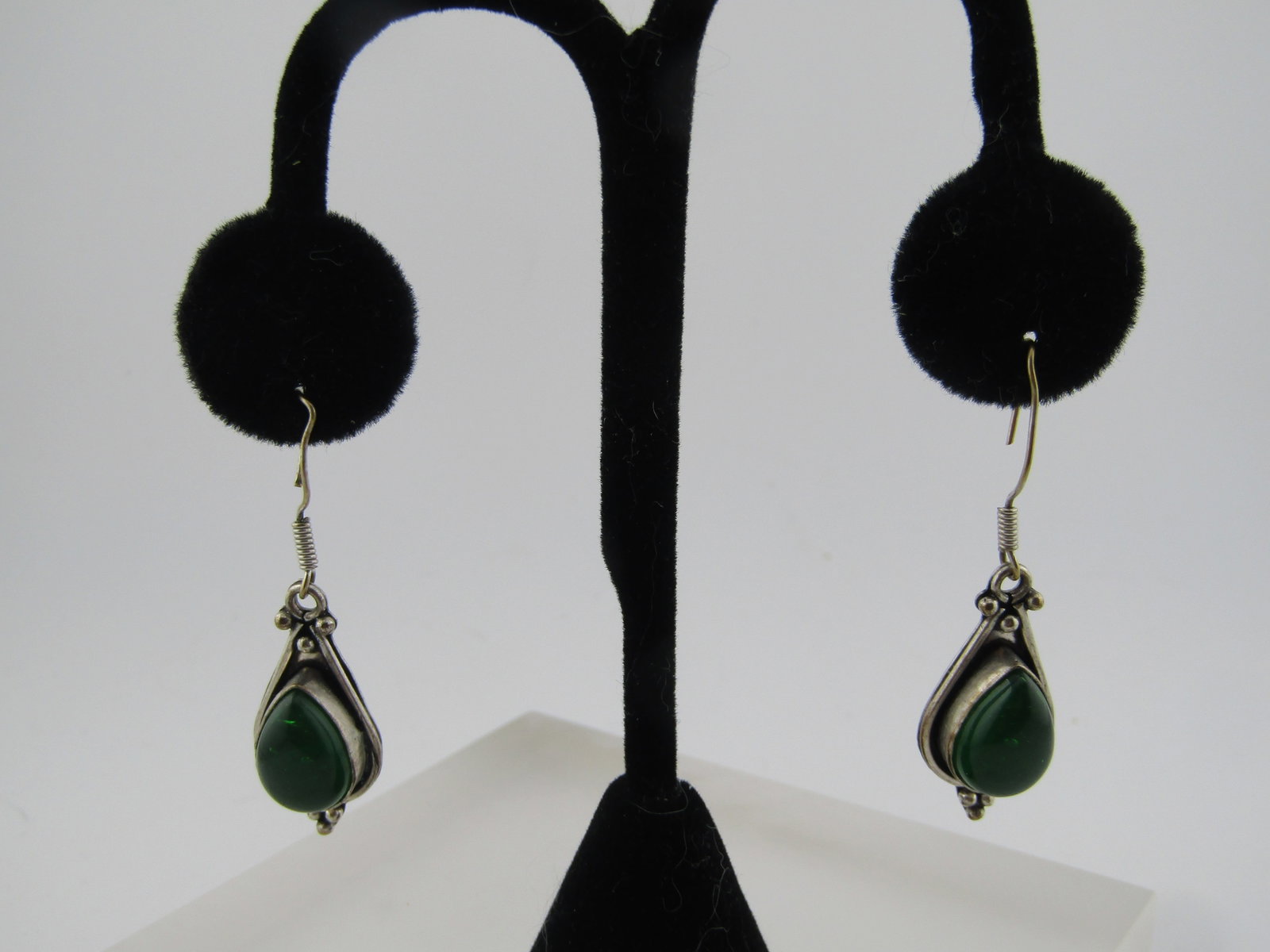 Vintage Green Glass Boho Drop Earrings, Pierced, 1980's-1990's: Title: Vintage Green Glass Boho Drop Earrings, Pierced, 1980's-1990's Description: Vintage silver tone green glass boho drop earrings, pierced. 1980's-1990's. These have hook posts and the stones are 