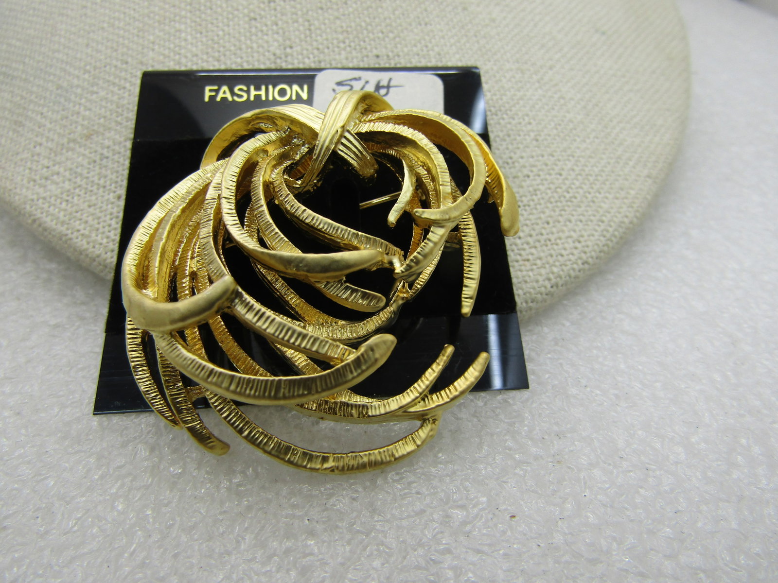 Vintage Tiered Curved Swag Brooch, Gold Tone,: Title: Vintage Tiered Curved Swag Brooch, Gold Tone, Description: Vintage Tiered Curved Swag Brooch, Gold Tone, nearly 2" wide and tall, 1970's, 1980's. Vintage new on card. Not signed by maker.