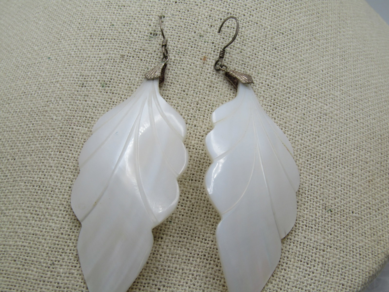 Vintage Mother-of-Pearl Carved Leaf Earrings, Pierced, 3.75": Title: Vintage Mother-of-Pearl Carved Leaf Earrings, Pierced, 3.75" Description: Vintage Mother-of-Pearl Carved Leaf Earrings, Pierced, 3.75" by 1.25" wide. Mother-of-pearl with a leaf shape and