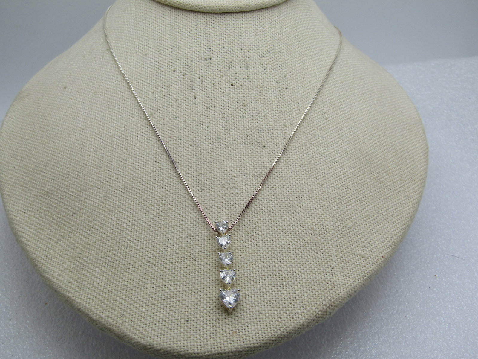 Vintage Sterling Heart CZ Necklace, 18", Signed: Title: Vintage Sterling Heart CZ Necklace, 18", Signed Description: Vintage Sterling Heart CZ Necklace, 18", Signed JC and ASE. This has a pendant with five clear heart CZs that range from 3mm to 5.5m