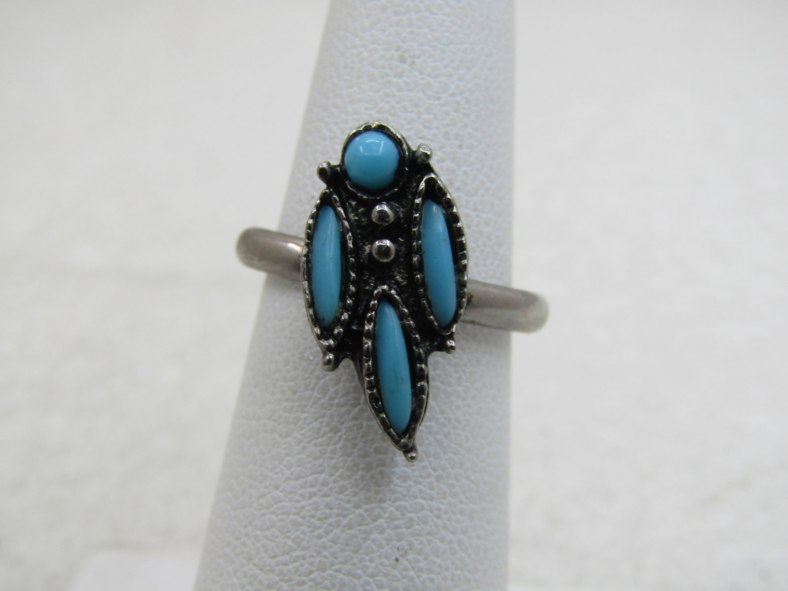 Vintage Southwestern Faux Turquoise Ring, Adj. Sz. 5-7, Silver Tone, 1970's: Title: Vintage Southwestern Faux Turquoise Ring, Adj. Sz. 5-7, Silver Tone, 1970's Description: Vintage Southwestern Faux Turquoise Ring, Adj. Sz. 5-7, Silver Tone, 1970's. The band is appx. 2.5mm at 
