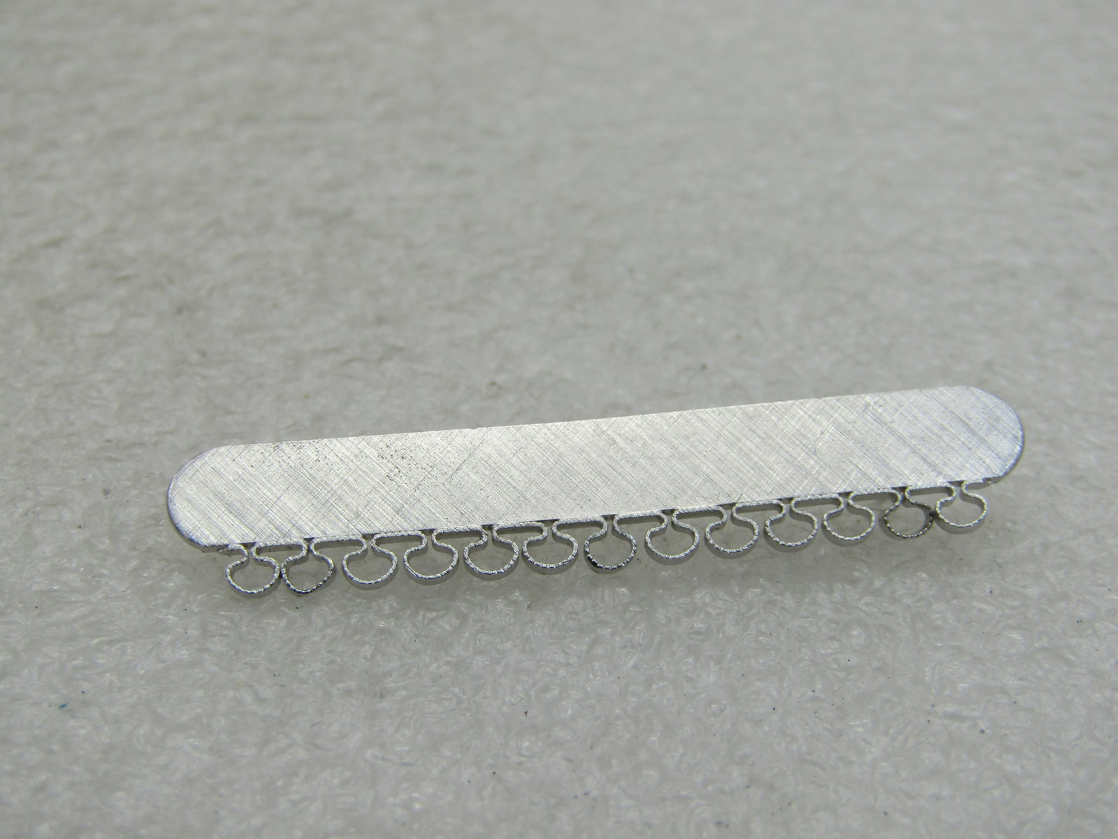 Vintage Sterling Bar Brooch, Can Add Charms, 1-7/8", 3,11 Grams NL: Title: Vintage Sterling Bar Brooch, Can Add Charms, 1-7/8", 3,11 Grams NL Description: Vintage Sterling Bar Brooch, Can Add Charms, 1-7/8", 3,11 Grams. This is txtured finish with loops that hang from