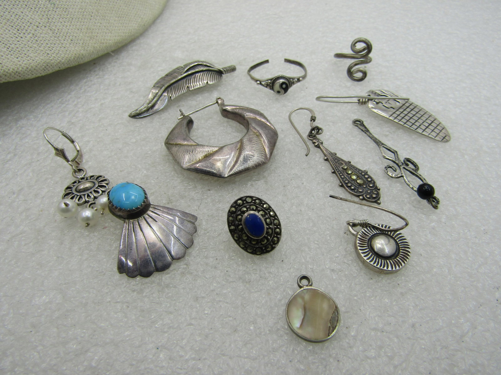 12 Sterling Pieces, Single Earrings, Dangles, more. 25.49 grams - 2