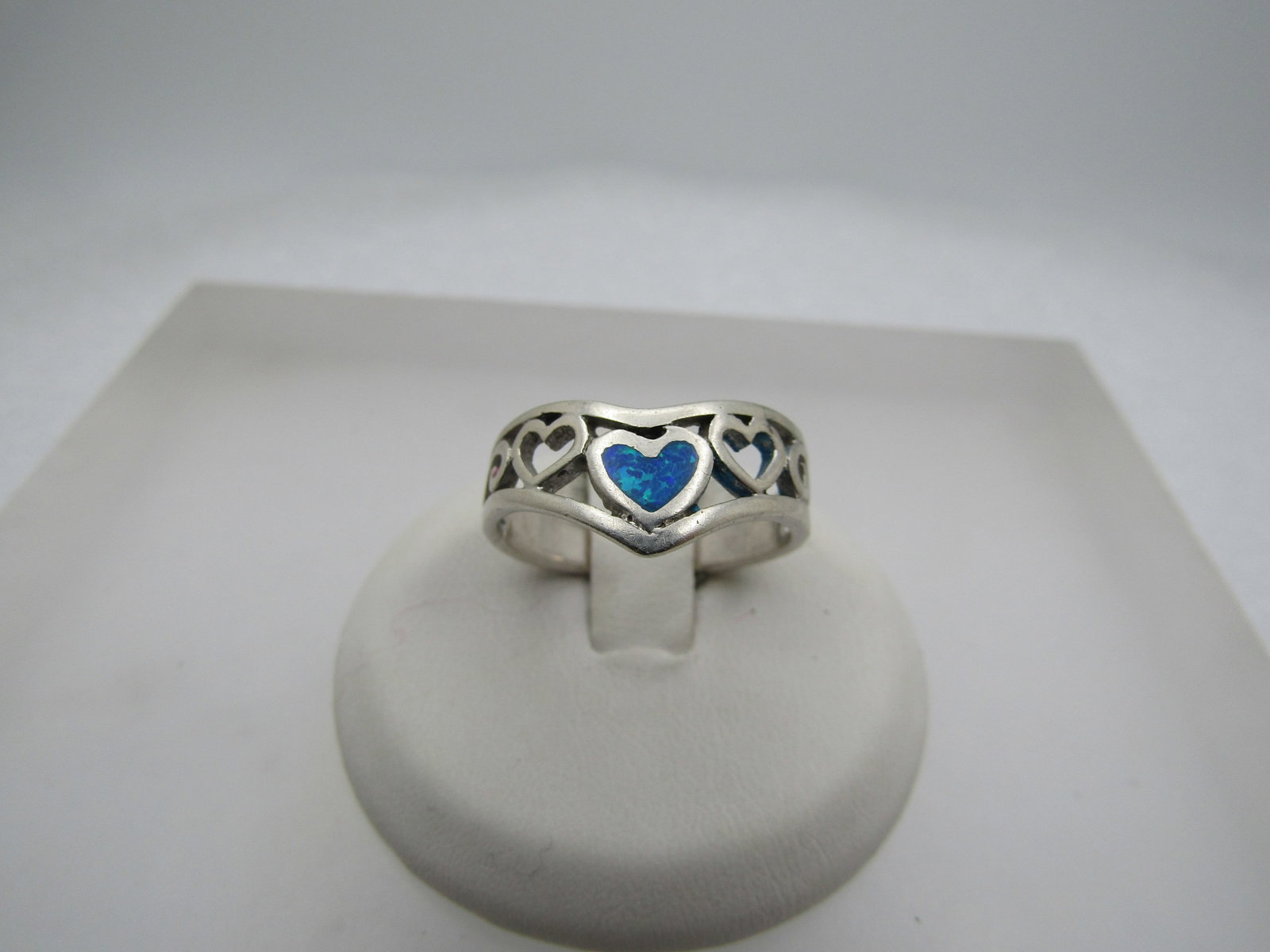 Vintage Sterling Faux Inlaid Opal Heart Ring, Sz. 7.25, 1970's-1980's Signed: Title: Vintage Sterling Faux Inlaid Opal Heart Ring, Sz. 7.25, 1970's-1980's Signed Description: Vintage Sterling Faux Inlaid Opal Heart Ring, Sz. 7.25, 1970's-1980's Signed with $ and marked .925. It