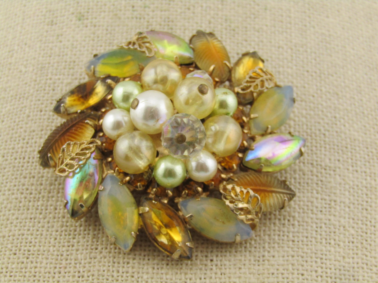 Vintage Rhinestone Faux Pearl Blossom Brooch, 1940's: Title: Vintage Rhinestone Faux Pearl Blossom Brooch, 1940's Description: Vintage Rhinestone Faux Pearl Blossom Brooch, 1940's. This brooch has tiered pearls and faceted glass or crystal beads in the c