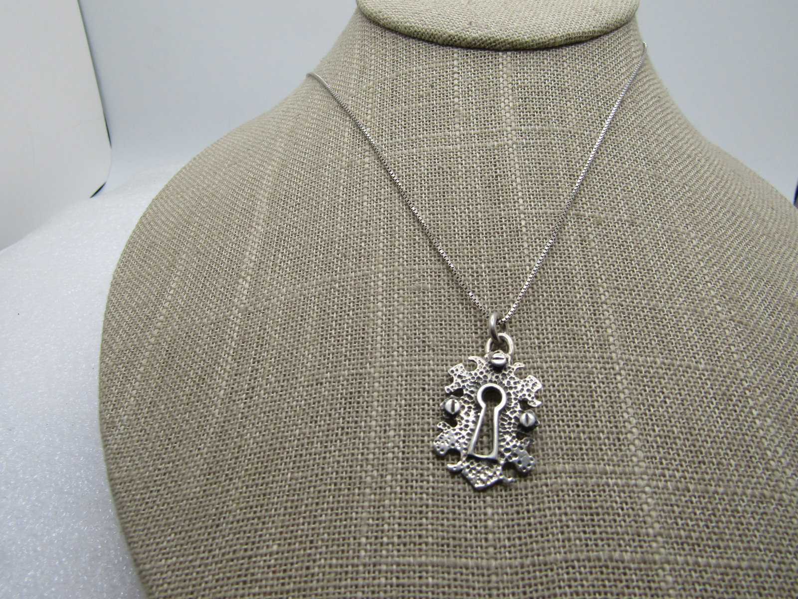 Vintage Sterling Keyhole Necklace, 20", 1980's-1990's, Signed K.H.: Title: Vintage Sterling Keyhole Necklace, 20", 1980's-1990's, Signed K.H. Description: Vintage Sterling Keyhole Necklace, 20", 1980's-1990's, Signed K.H. An old time keyhole pendant with textured plat