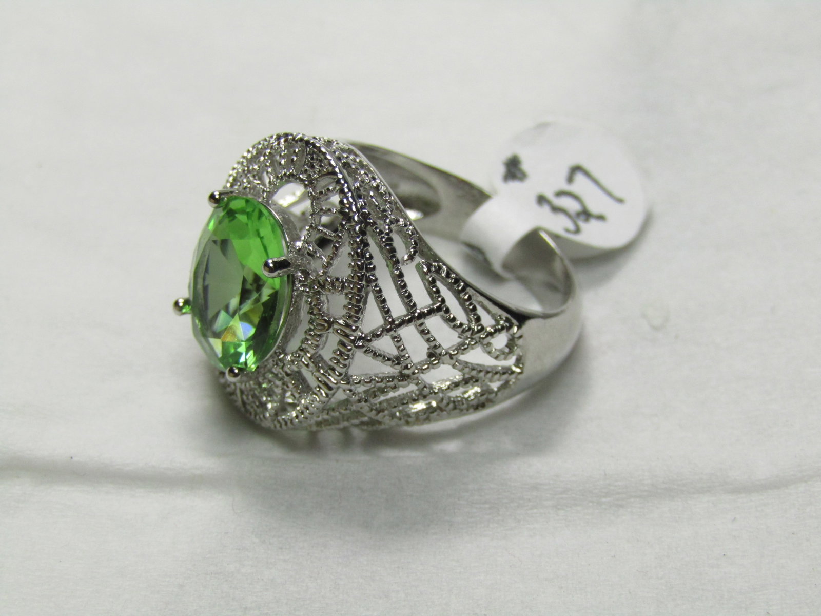 Silver Filigree Green Crystal Ring, Sz. 8.5, Statement Ring: Title: Silver Filigree Green Crystal Ring, Sz. 8.5, Statement Ring Description: Silver Filigree Green Crystal Ring, Sz. 8.5, Statement Ring. It has a peridot green colored crystal stone that is a face