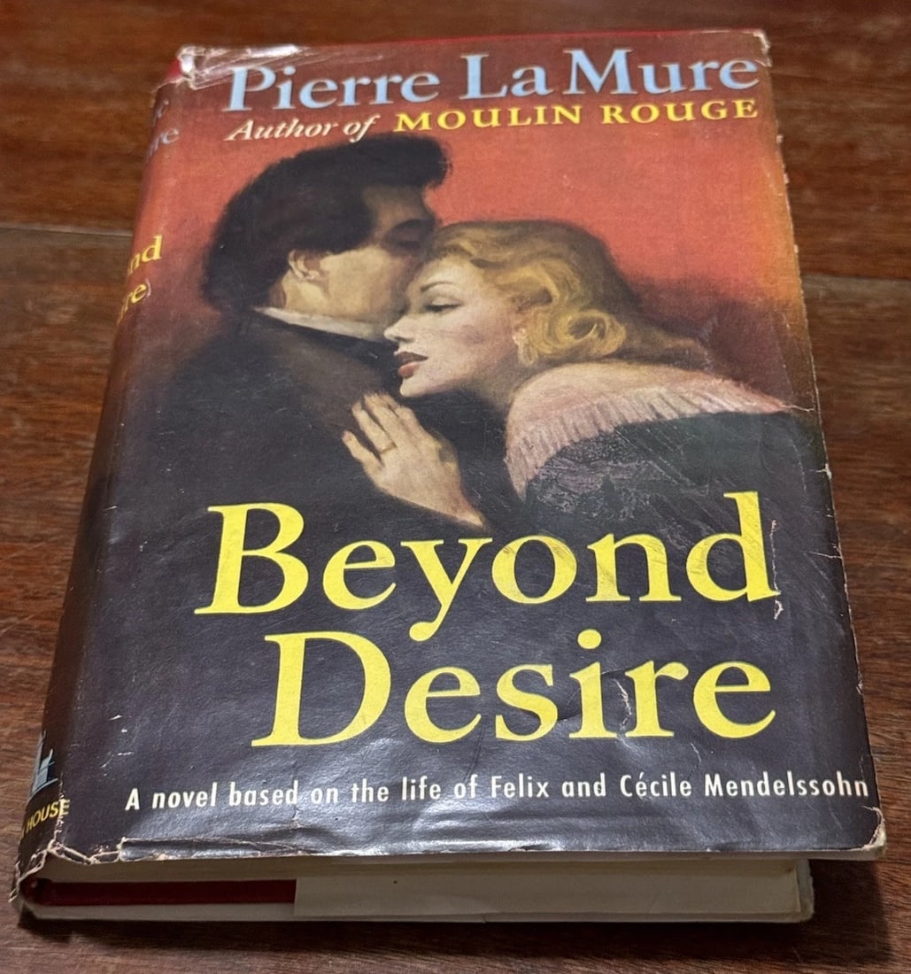 Beyond Desire: A Novel Based on the Life of Felix and Cecile Mendelssohn HC/DJ: Beyond Desire is a first edition novel published by Random House written by Pierre La Mure, exploring the captivating lives of Felix and Cecile Mendelssohn. The book, bound in hardcover, provides read