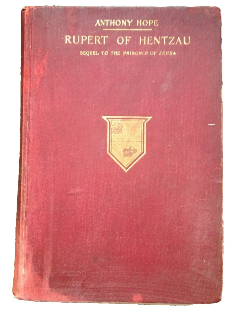 RUPERT OF HENTZAU Anthony Hope Hardcover 1898 Henry Holt & Co. Antique: RUPERT OF HENTZAU Hope, Anthony Published by Henry Holt and Company, 1898. Hardcover. Maroon cloth boards with gilt titles and shield design to front cover, gilt title to spine, no DJ. This is a seque