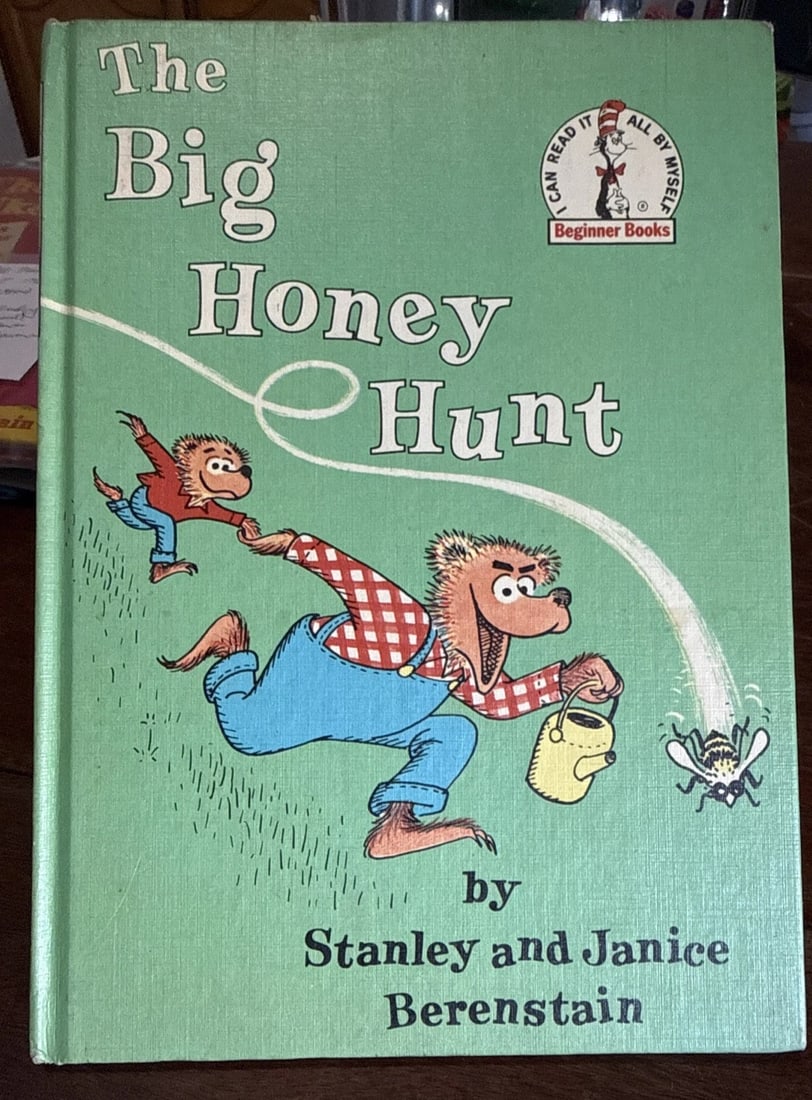 The Big Honey Hunt Stanley and Janice Berenstain 1962 Beginner Bks BCE VG1st/1st: The Big Honey Hunt by Stan and Jan Berenstain is a children's book published by Random House in 1962. This illustrated hardcover book, featuring Berenstain's iconic characters from the Beginner Books 