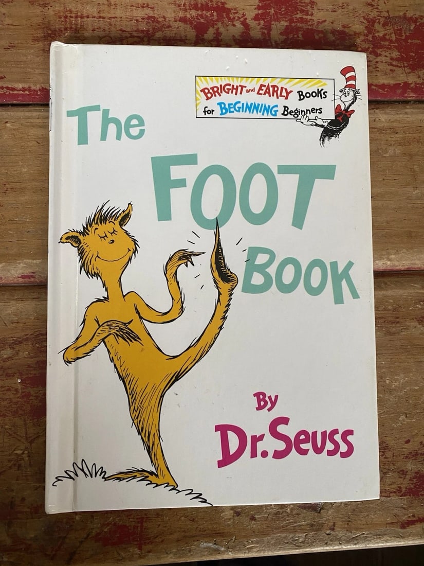 THE FOOT BOOK Dr. Seuss Grolier 1stEd Message Reprint 1993 HC No Writing RARE: This rare hardcover edition of "The Foot Book" by Dr. Seuss, published by Grolier in 1993, is a must-have for fans of the beloved children's author. The book measures 9 inches in length, 6.5 inches in