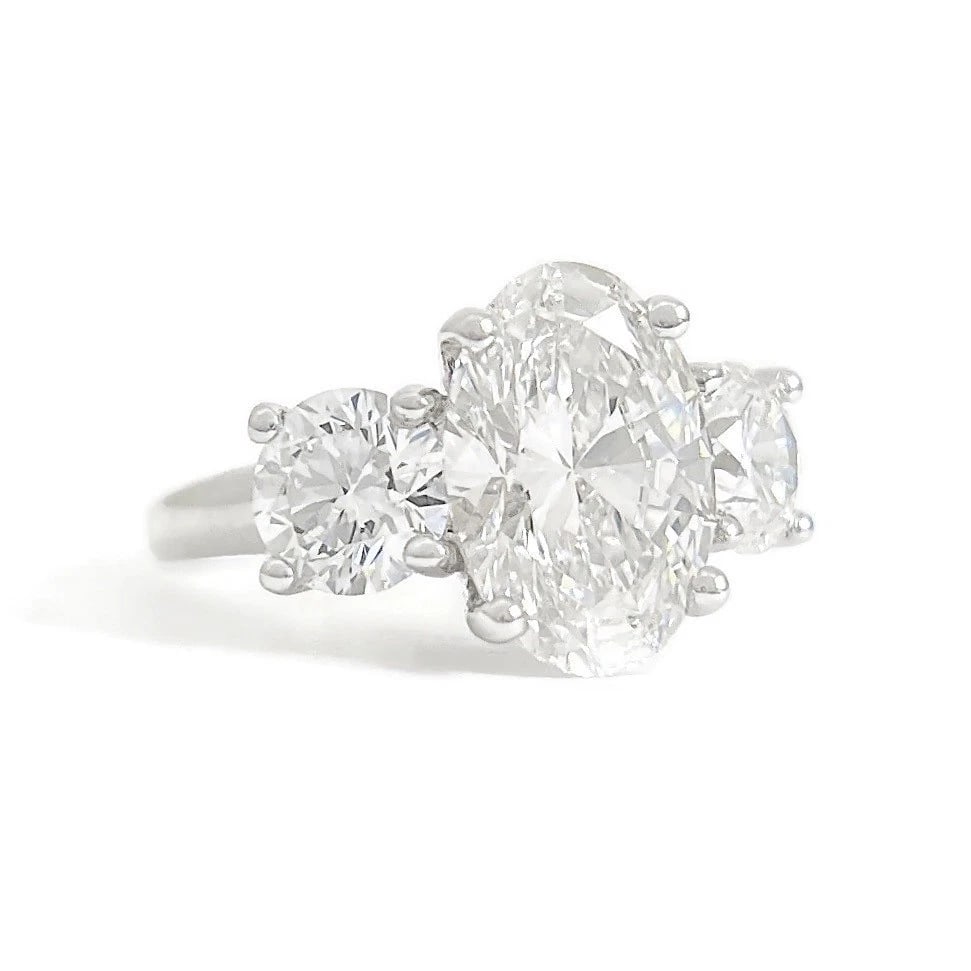 3-Stone Oval Round Lab-Created Diamond Engagement Ring 14K White Gold, 4.09 CTW: Title: 3-Stone Oval Round Lab-Created Diamond Engagement Ring 14K White Gold, 4.09 CTW Description: 3-Stone Oval Round Lab-Created Diamond Engagement Ring 14K White Gold, 4.09 CTW This is a beautiful 