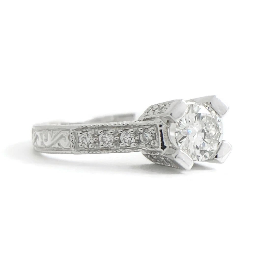 Round Diamond Milgrain Pave Textured Engagement Ring Platinum .75 CTW: Title: Round Diamond Milgrain Pave Textured Engagement Ring Platinum .75 CTW Description: Round Diamond Milgrain Pave Textured Engagement Ring Platinum .75 CTW This is a gorgeous diamond engagement
