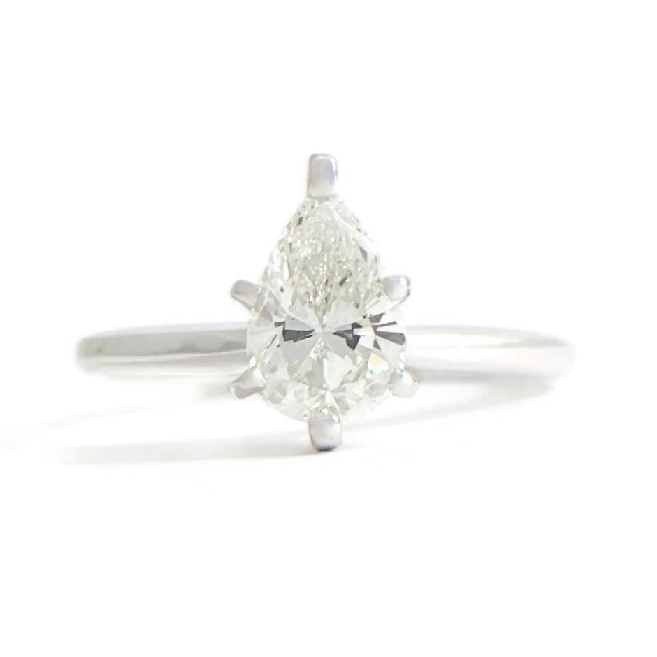 Pear Solitaire Diamond Engagement Ring 14K White Gold .82 CT, 2.29 Grams: Title: Pear Solitaire Diamond Engagement Ring 14K White Gold .82 CT, 2.29 Grams Description: Pear Solitaire Diamond Engagement Ring 14K White Gold .82 CT, 2.29 Grams This lovely diamond engagement