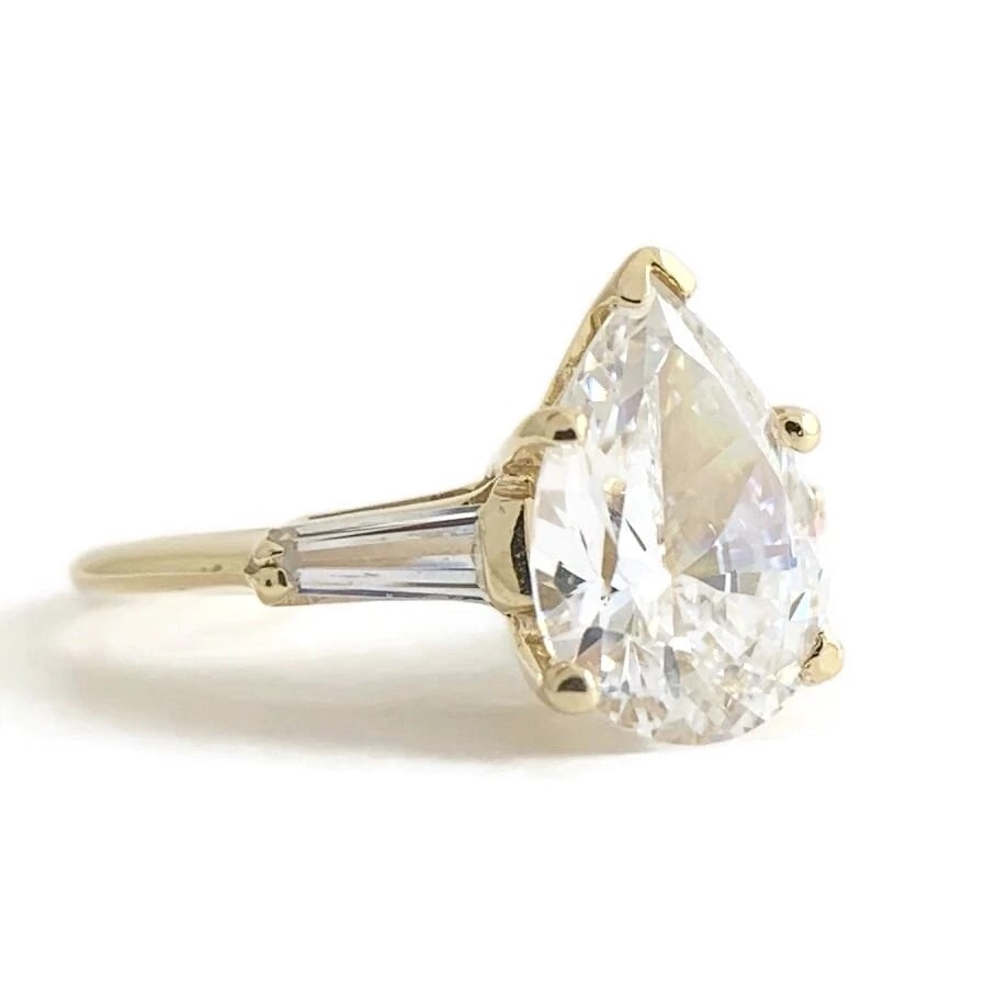 Pear Tapered Baguette CZ Cubic Zirconia Engagement Ring 14K Yellow Gold, 2.26 Gr: Title: Pear Tapered Baguette CZ Cubic Zirconia Engagement Ring 14K Yellow Gold, 2.26 Gr Description: Pear Tapered Baguette CZ Cubic Zirconia Engagement Ring 14K Yellow Gold, 2.26 Gr This is a