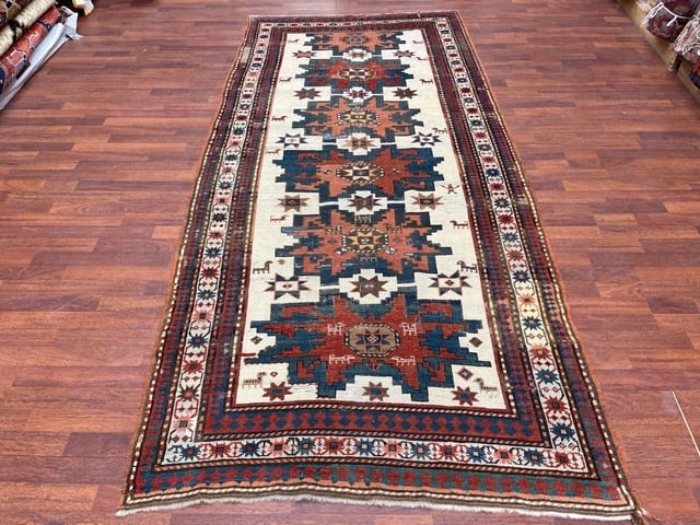 Antique ivory Field star design kazak caucasian rug-4819: Title:Antique ivory Field star design kazak caucasian rug-4819 Description:Georgous antique Kazak caucasian rug from southwest Caucasian,size 4 ft. 3 inches by 9 ft, circa 1890, lesghi star design, ex