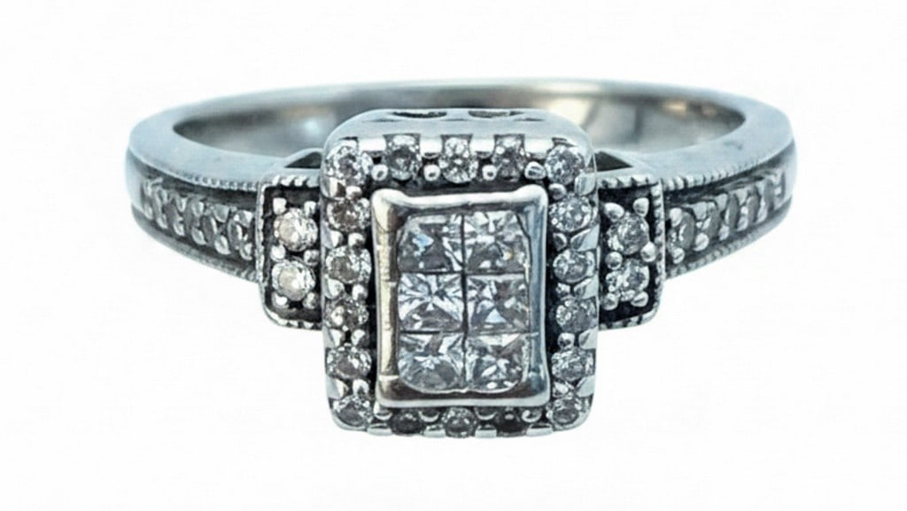 Sterling Silver and Diamond Accent Square Cluster Ring: This elegant ring features a square cluster of diamond accents set in sterling silver. The central square is surrounded by additional diamond accents on the shoulders, creating a sparkling and
