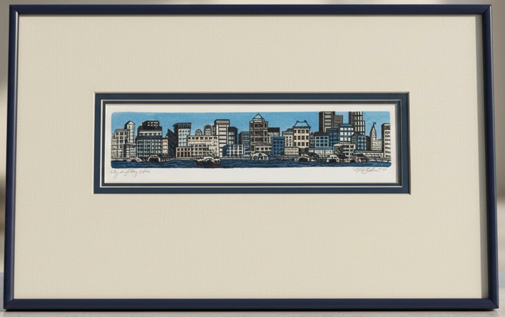 Mark S. Gardner "City Sighting" Framed Print, 1994: A framed print by Mark S. Gardner, titled "City Sighting" and dated 1994. The print depicts a city skyline with buildings along a waterfront, featuring boats on the water. The artist's signature and