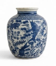 Chinese Blue and White Porcelain Koi Motif Vase: In the same family for over sixty years, this porcelain vase features a traditional Chinese blue and white underglaze decoration depicting koi fish swimming amidst aquatic plants. The vase has a