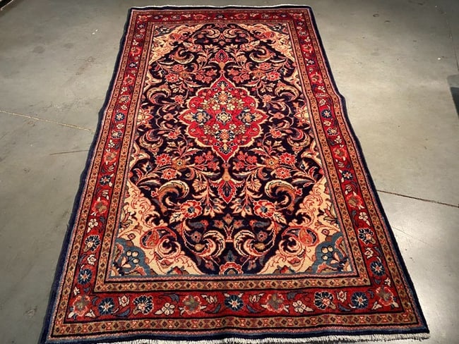 MAGNIFICENT PERSIAN SAROUK RUG 4.4x7.8: Title:MAGNIFICENT PERSIAN SAROUK RUG 4.4x7.8 Description:4'.4"X7'.8" Authentic Persian Sarouk Rug in Navy Blue and multi accent colors 100% wool Hand knotted in Iran Reserve: $580.00 Shipping: