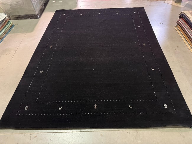 Magnificent Gabbeh Rug 9x12: Title:Magnificent Gabbeh Rug 9x12 Description:Decorative Fine weave Gabbeh rug, 100% natural Veggie Dye wool pile in Black color. Hand Knotted in India, 9x12 Reserve: $1,400.00 Shipping: Domestic: Fla