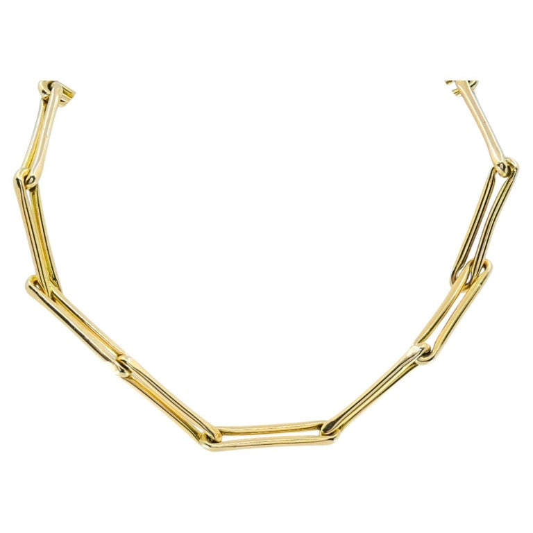 14k Gold Italian Elongated Bar Link Chain Necklace: This 14k gold necklace features a bold paperclipâ€‘style bar link design. The elongated rectangular links have a polished finish, giving the chain a clean, geometric look that sits sm