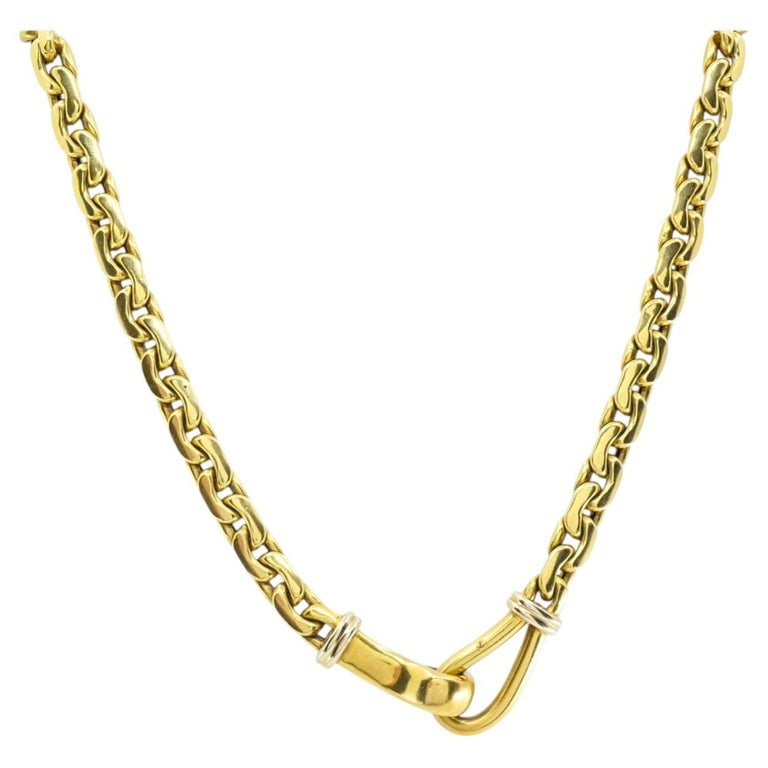 Vintage Italian 18k Gold Link Necklace Sculpted Front Element: This vintage 18k Italian gold necklace features a solid rounded curbâ€‘style link chain and a sculpted front element. The links have a compact, interlocking profile with softly domed