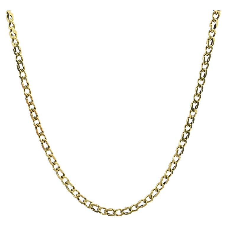 O.P. Orlandini for UnoAErre Vintage Italian 14k Gold Curb Link Chain Necklace: This vintage Italian 14k gold curbâ€‘link chain necklace is a signed design by O.P. Orlandini for UnoAErre, the renowned Arezzo goldsmith. The necklace showcases solid, closely