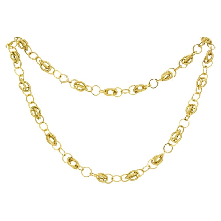 Vintage Italian 14k Textured Link Long Chain Necklace: Beautifully crafted long Italian 14k gold chain necklace featuring alternating smooth round links and textured double oval links, creating an elegant, dimensional look that drapes effortlessly on the 