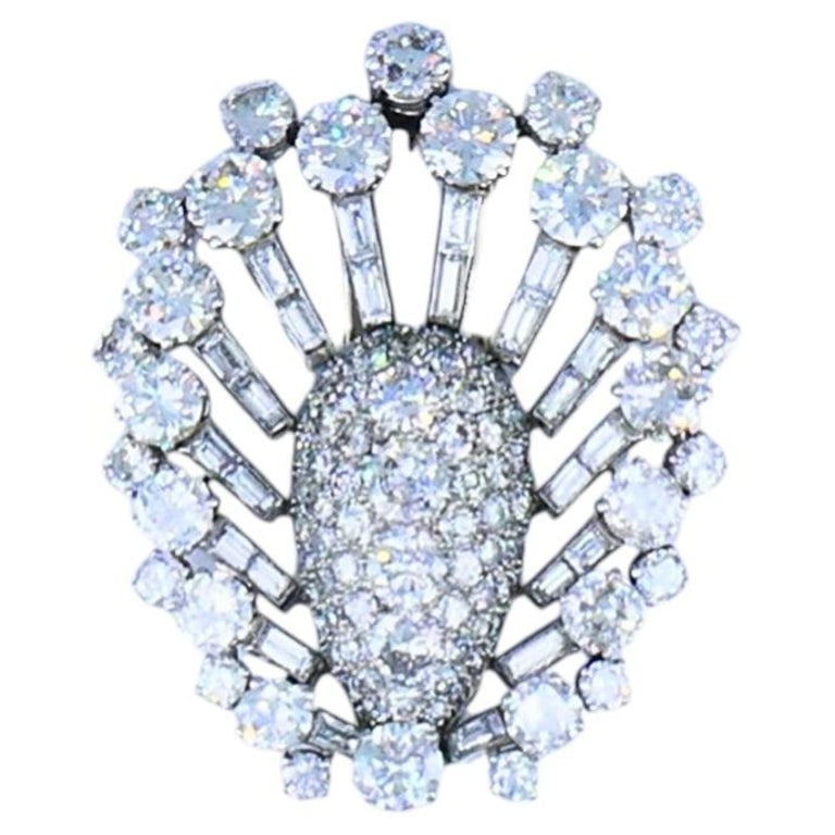 Vintage 1950s Platinum Diamond Peacock Brooch Clip Old European Baguette Cut: A stunning vintage platinum diamond peacock clip brooch, circa 1950s. The brooch showcases a remarkable mix of transitional, Old European, and baguette cut diamonds totaling approximately 20 carats.