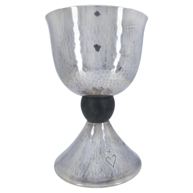 1920â€™s French Sterling Silver Large Challah Goblet Cup: This elegant antique French silver goblet showcases refined craftsmanship and timeless form, featuring a hand-hammered finish that gives the surface a beautiful, softly textured character. The classic