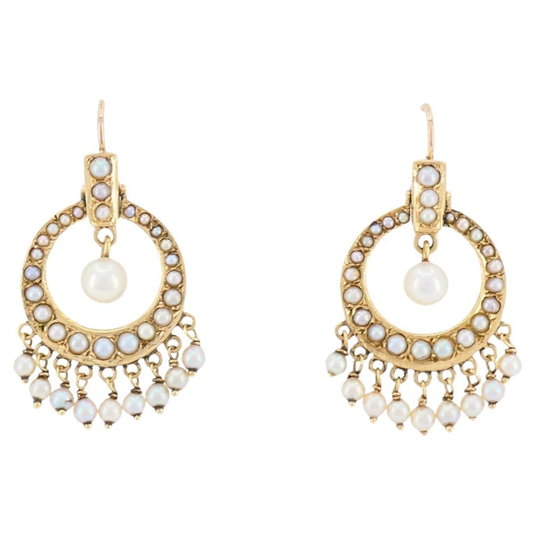 Antique Edwardian 14K Gold Pearl Drop Earrings, Circa 1900: Elegant antique earrings dating to the late Victorian to early Edwardian period, circa 1890sâ€“1910s. Crafted in solid 14K yellow gold, these refined earrings feature circular forms