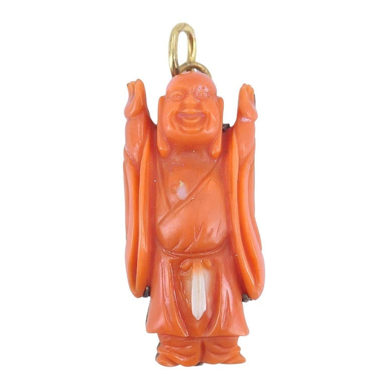 Vintage Coral Buddha Charm Pendant 10k Gold, Mid-20th Century, 4.2g: Vintage coral Buddha charm carved in natural coral and mounted in 10k gold. The figure is flat-backed and secured to a gold plate, with a fixed gold bale for wear on a chain or charm bracelet. The
