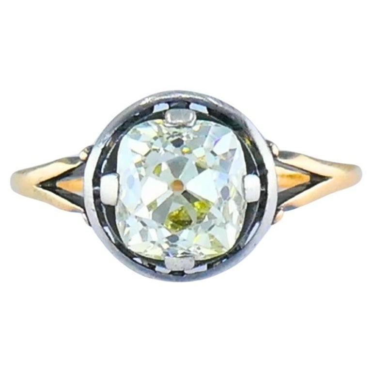 Victorian Engagement Ring 14k Gold Silver Old Mine Cut Diamond: A Victorian-era engagement ring featuring a remarkable 1.75-carat old mine cut diamond. The cushion-shaped gemstone displays the distinctive charm of antique cutting styles, with softly rounded facets