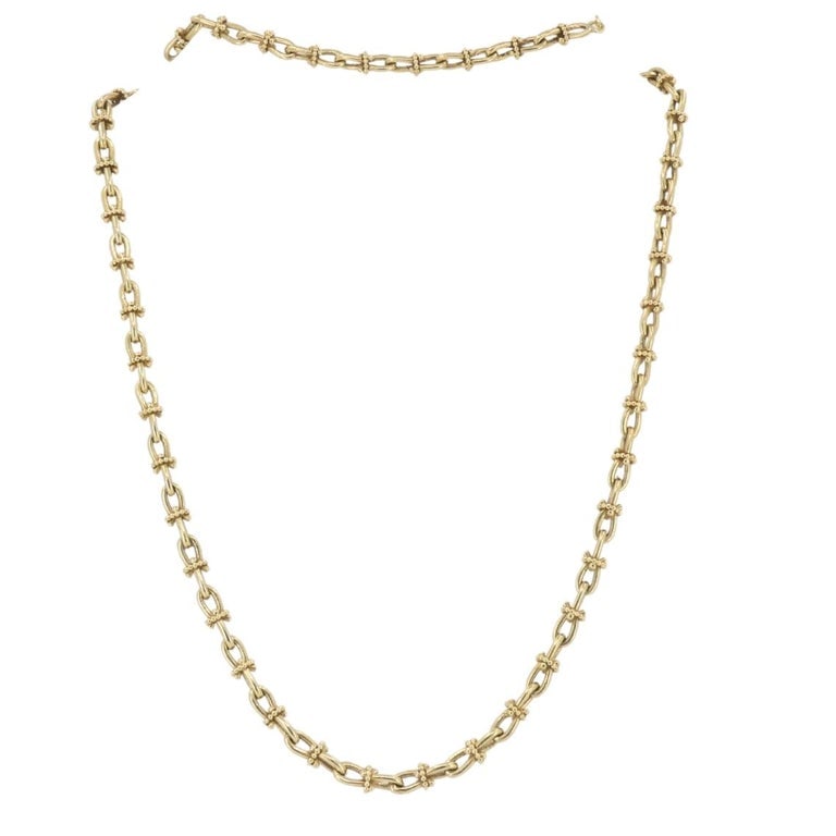 Vintage 14k Gold Nautical Chain Necklace Mariner Link Design: This vintage necklace features a classic 14k gold chain built with a detailed nautical design. Each link follows the mariner style, giving the chain a clean, structured look. The elongated oval links 