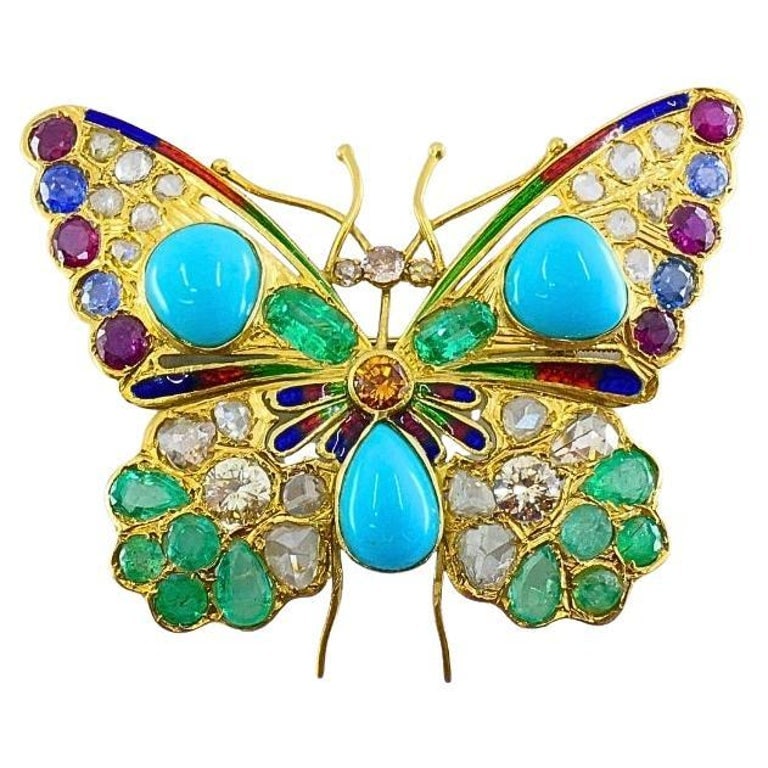 Vintage 18k Gold Multigem Butterfly Brooch Statement Insect Jewelry: CIRCA: 1950s MATERIALS: 18k Gold GEMSTONE: Turquoise, Diamond WEIGHT: 18.5 Grams MEASUREMENTS: 2 Â¼â€ x 1 Â¾â€ (5.7 x 4.2 cm) HALLMARKS: 18K ITEM