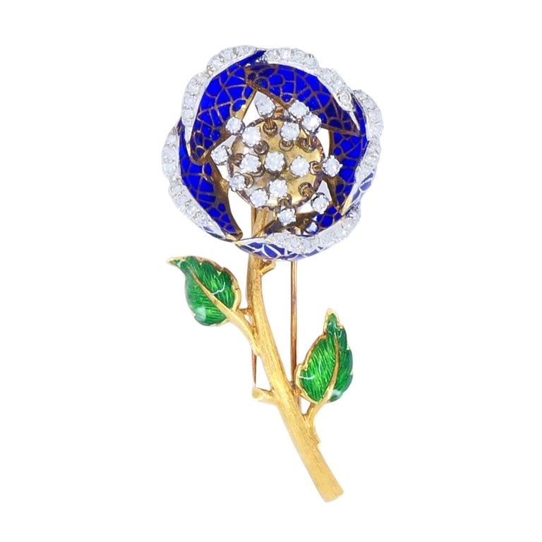 Vintage 18k Gold Diamond Enamel Flower Pendant Clip Brooch: An exquisite floral pendant brooch, crafted in 18k yellow gold, diamond, and enamel, circa 1950sâ€“1960s. This remarkable mid-century creation features a dimensional flower design wit