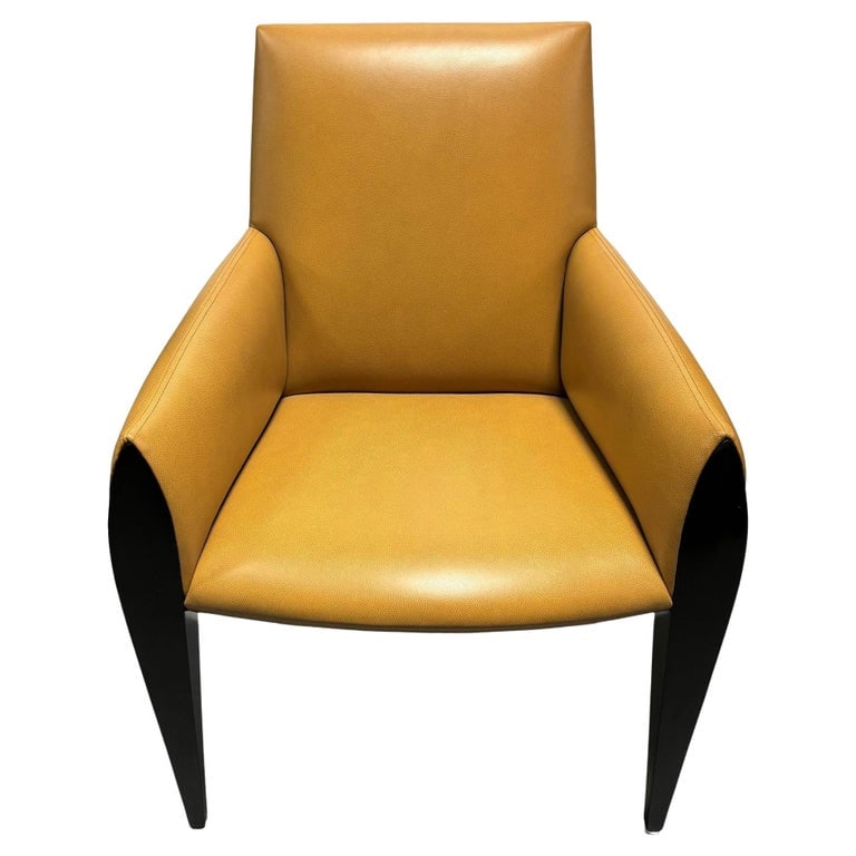 Dakota Jackson "Ke-Zu" Camel Leather Armchair: The "Ke-Zu" armchair was designed by Dakota Jackson from his classic Ke-Zu Collection. It is characterized by a form-fitted design that is luxuriously sculpted to the body. Kiln-dried hardwood frame,